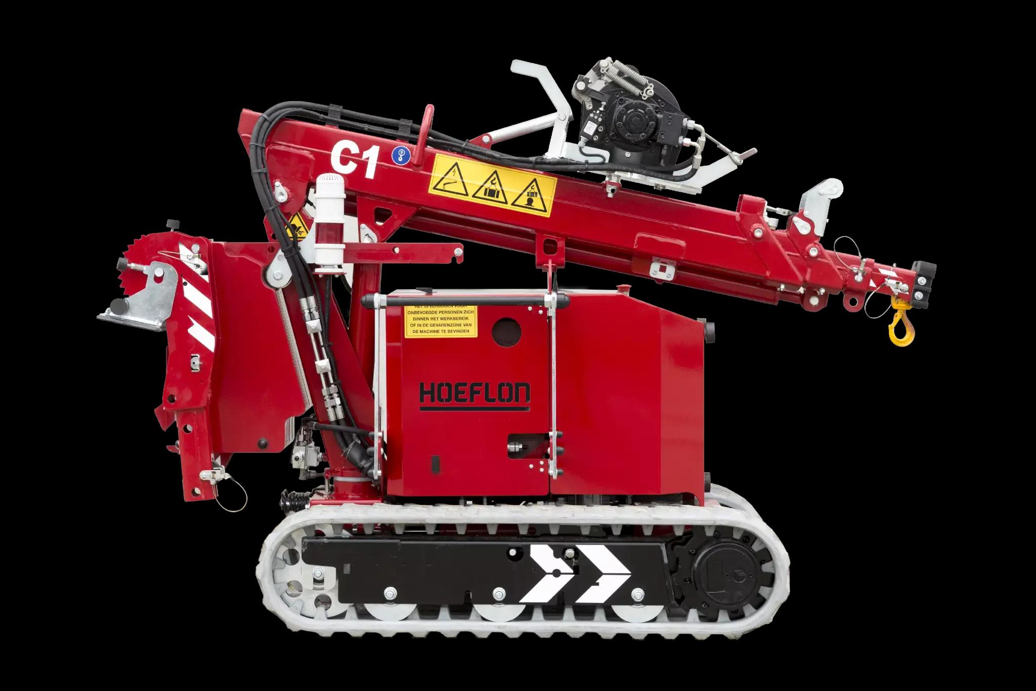 Image de la grue Hoeflon C1e en mode transport, vue latérale.