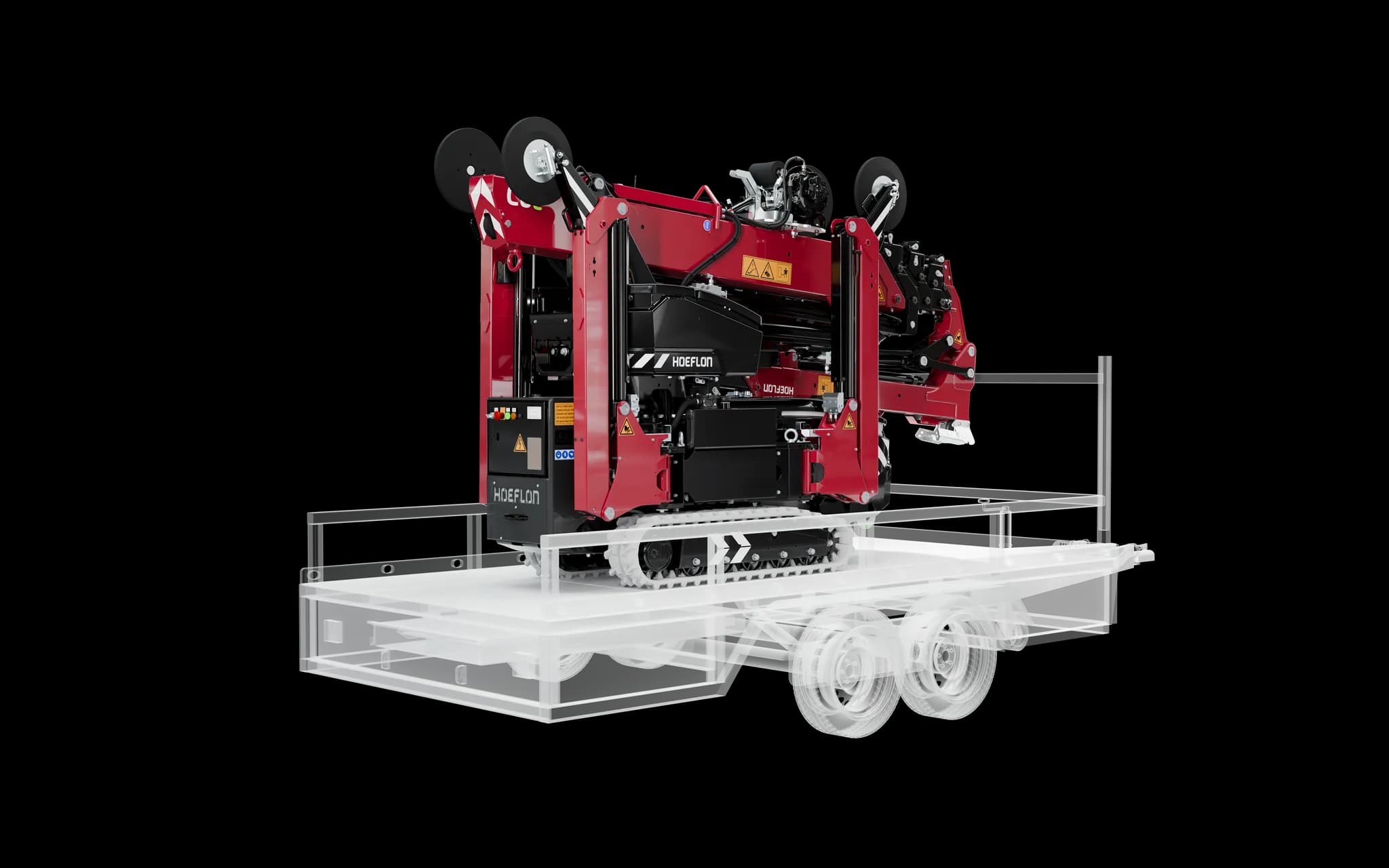 C6e sur une remorque avec la machine en position repliée.